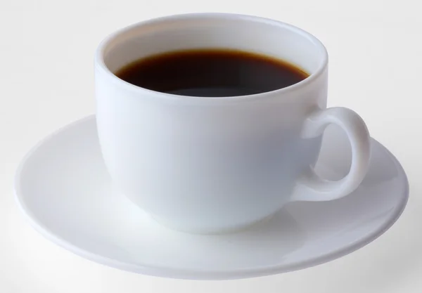 Чашка кофе и тарелка — стоковое фото