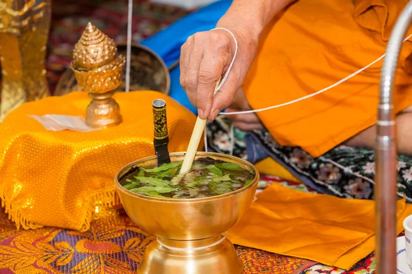 Monk do holy water — Stock Photo, Image