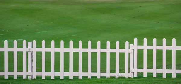 Lawn and fence — Stock Photo, Image