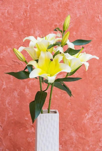 Yellow lily in vase — Stock Photo, Image