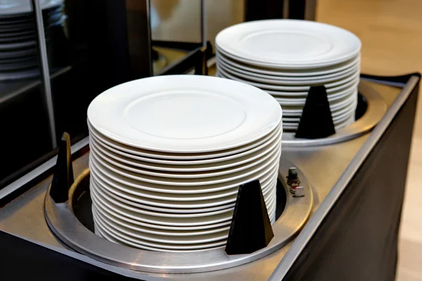 Dishes and warmer cart — Stock Photo, Image