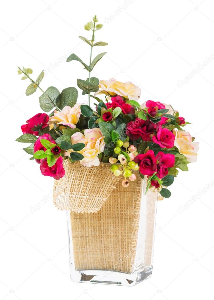 Bouquet of rose and jasmine in glass vase