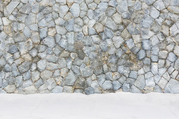 Stenen muur naast de zee — Stockfoto