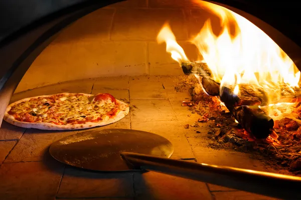 Firewood oven pizza — Stock Photo, Image