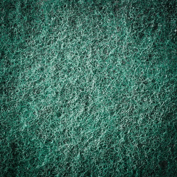 Vignette style green cleaning pad texture — Stock Photo, Image