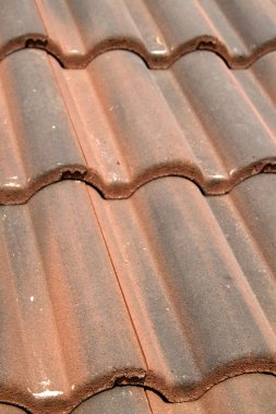 Close-up of tiles on a roof renovation
