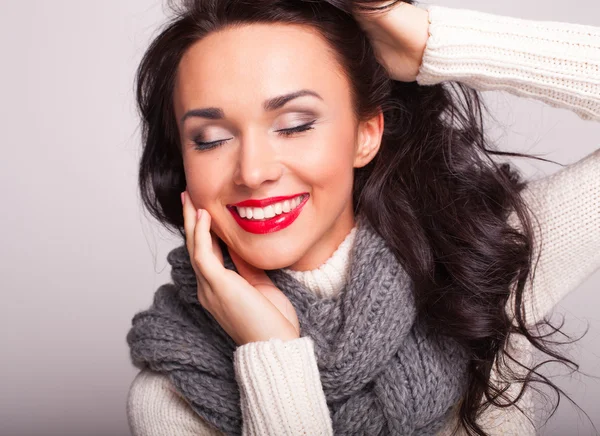 The girl close up in a warm sweater and a scarf — Stock Photo, Image