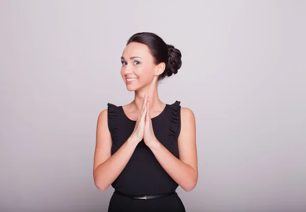 The young woman looking excited against white background — Stock Photo, Image