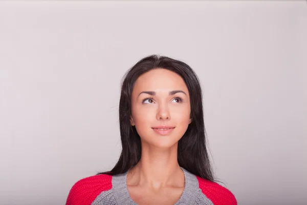 The beautiful girl looks up — Stock Photo, Image