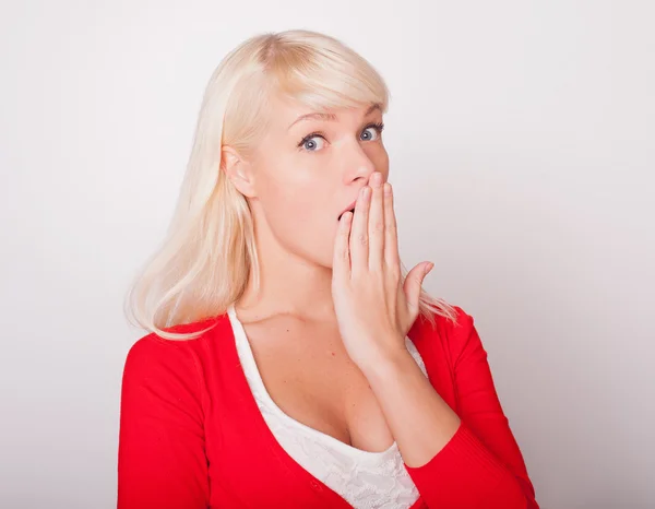 The beautiful fresh blonde the girl is surprised and very glad — Stock Photo, Image