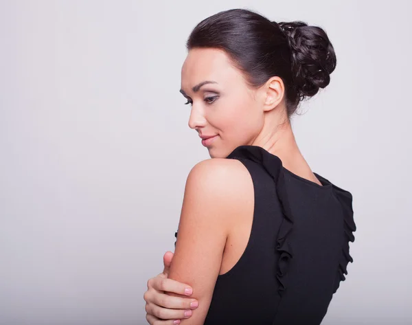 Business woman in a black dress — Stock Photo, Image