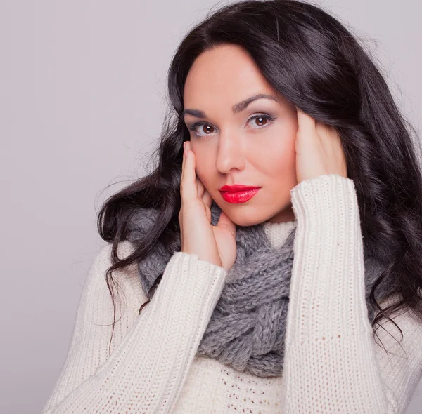 Beautiful girl in a scarf — Stock Photo, Image