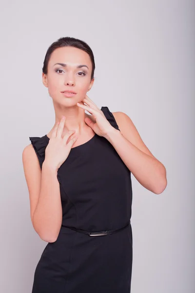 Business woman in a black dress — Stock Photo, Image