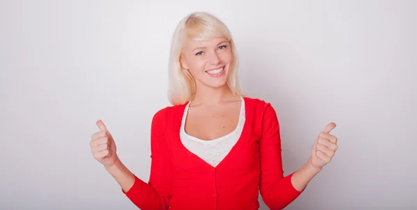 Close up a thumb which the beautiful blonde shows — Stock Photo, Image