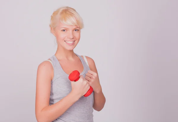 Chica con mancuernas — Foto de Stock