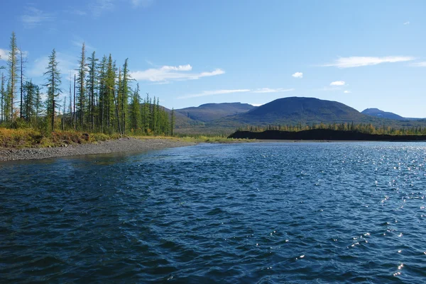 Blue river under the blue sky. — Stock Photo, Image