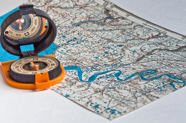 Compass and a map. — Stock Photo, Image