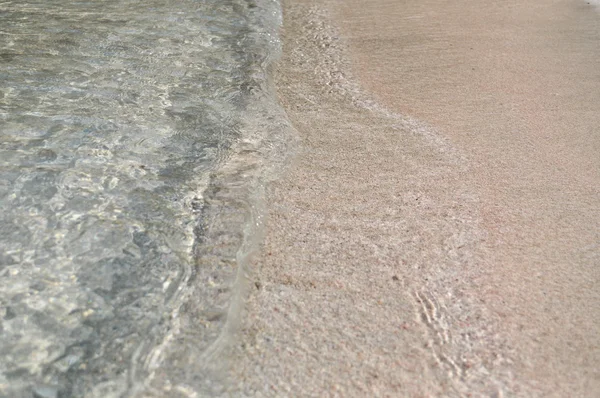 De textuur van het zand op het strand. — Stockfoto