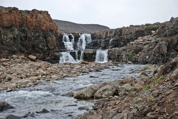 Landscape with rocks and a waterfall. — Stockfoto