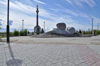A monument in honor of the founding of the city. Yakutsk. clipart