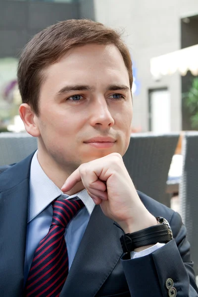 Portrait of a successful young businessman who came up with the idea of — Stock Photo, Image