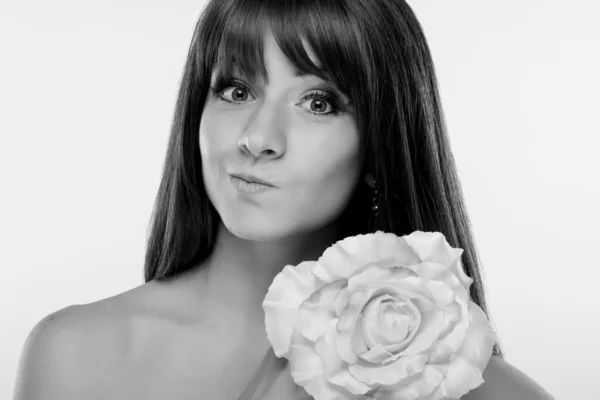 Potrtret black and white girl with a flower — Stock Photo, Image