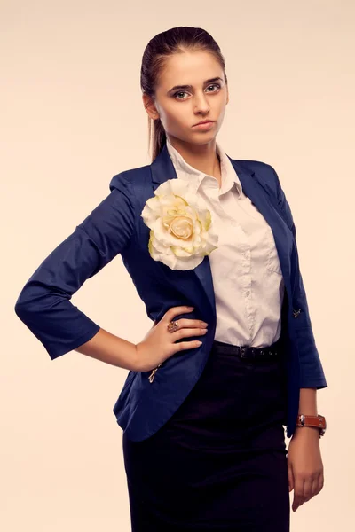 Portrait of a girl in a suit, hand on hip, stylized retro — Stock Photo, Image