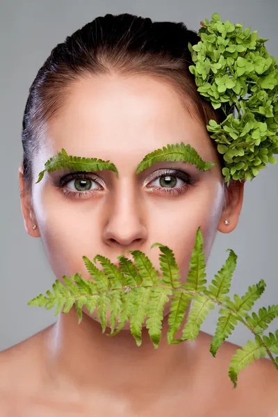 Fern girl covers her mouth — Stock Photo, Image