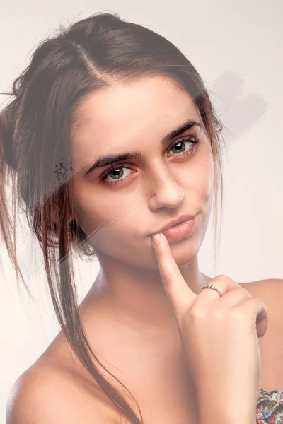 Portrait of a girl is conceived of something (isolated eye color) — Stock Photo, Image