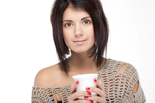 Portrait d'une fille en pull avec une tasse — Photo