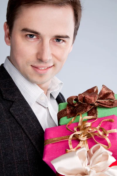 Velký portrét muže s dárky — Stock fotografie