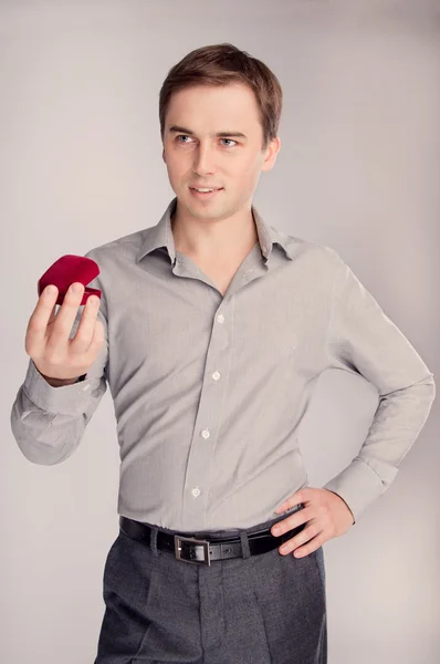 Portrait of a man holding a jewelry box (retro) — Stock Photo, Image