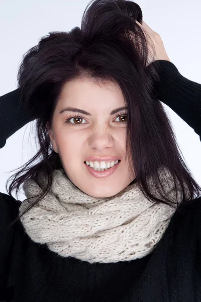 Girl screaming and holding his hair shook his throat scarf — Stock Photo, Image