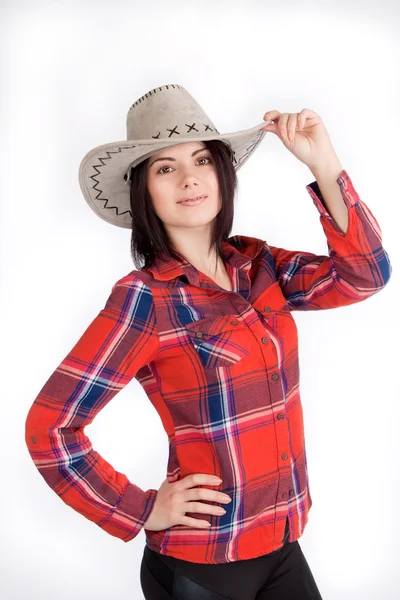 Chica sombrero de vaquero y camisa a cuadros, linda sonrisa —  Fotos de Stock