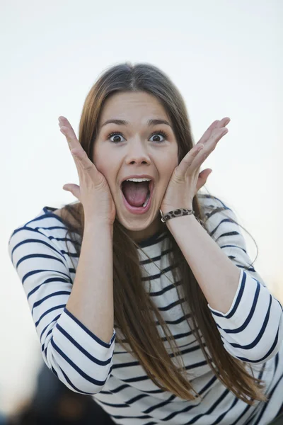 Woman looking surprised — Stock Photo, Image