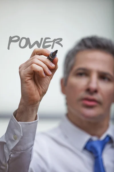 Businessman writing with a felt tip pen — Stock Photo, Image