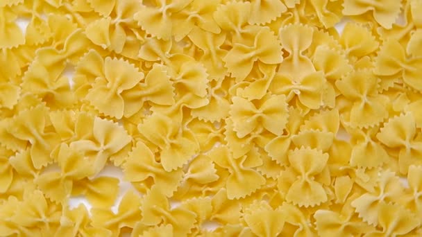 Uncooked pasta as background — Stock Video