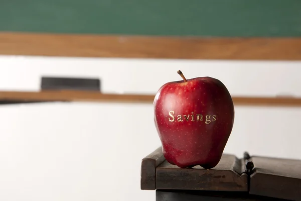 Apple in front of blackboard — Stock Photo, Image