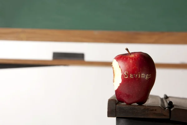 Apple in front of blackboard — Stock Photo, Image