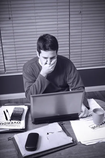 Man is shocked by his money problems — Stock Photo, Image