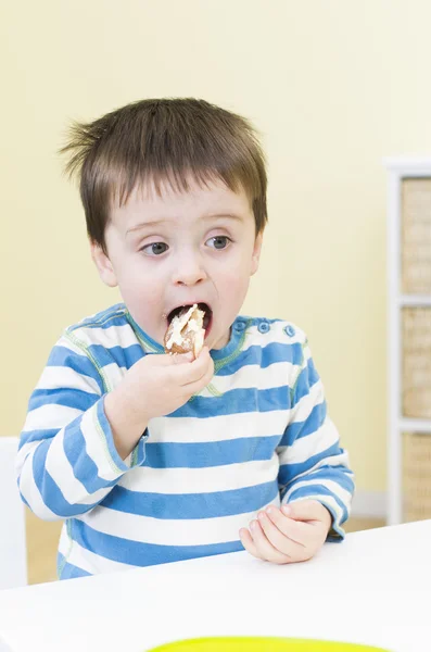 Young boy opens his mouth wide — Stock Photo, Image