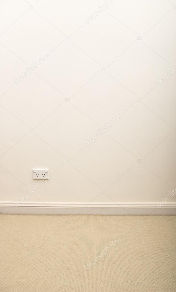 Cream wall with a power point