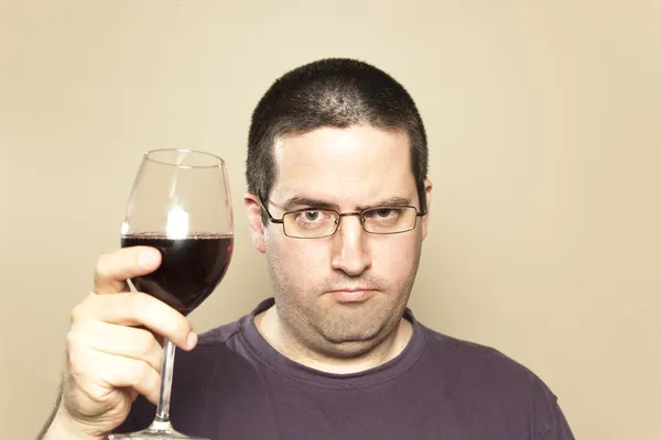 Man in glasses raises a toast — Stock Photo, Image