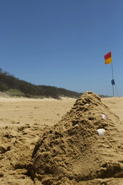 Castelo de areia em uma praia australiana — Fotografia de Stock