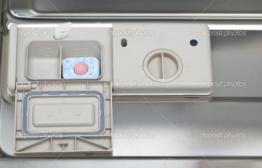 Dishwasher tablet in dispenser — Stock Photo © dcdp 19353617