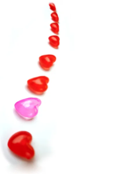 Plastic red and rose hearts — Stockfoto