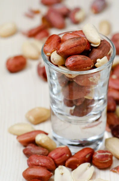 Amendoins em um copo — Fotografia de Stock