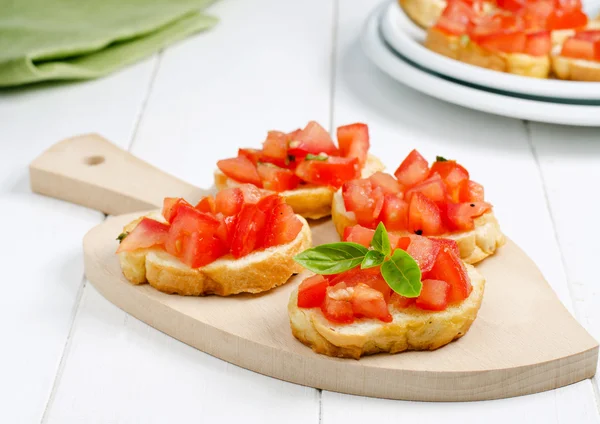 Snack italiano, bruschetta Imágenes de stock libres de derechos