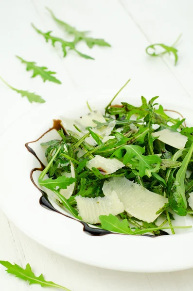 Rocket salad with parmesan — Stock Photo, Image