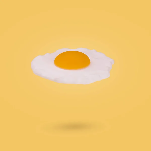 Minimal Idea Flying Fried Egg Yellow Background Creative Food Concept — Stock Photo, Image